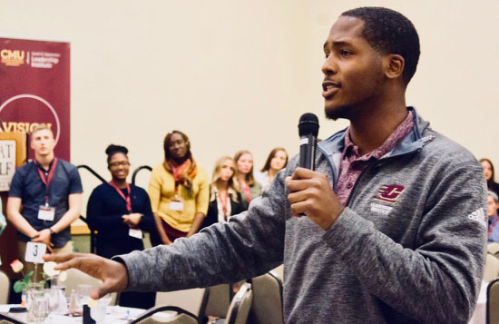 Student speaking at Connections Leadership Conference