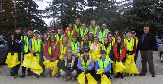 Members of Central Michigan's Greek community volunteer to clean up around Mt. Pleasant