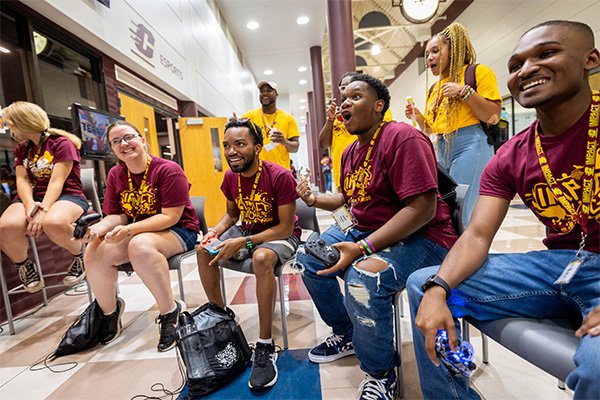 A group of students smiling and experiencing the IMPACT program at the beginning of the school year.