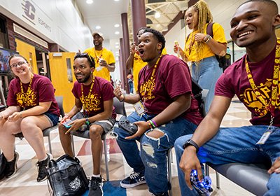 A group of students smiling and experiencing the IMPACT program at the beginning of the school year.