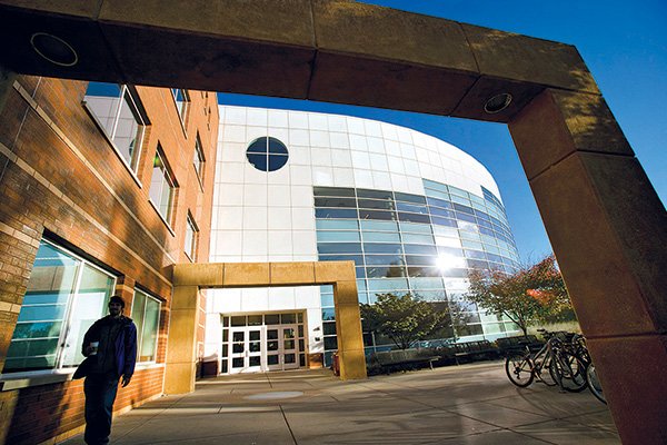 Student walking outside of Park Library