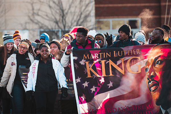 CMU students walking in the annual MLK march on campus