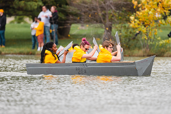 CMU students in the annual Homecoming carboard boat race