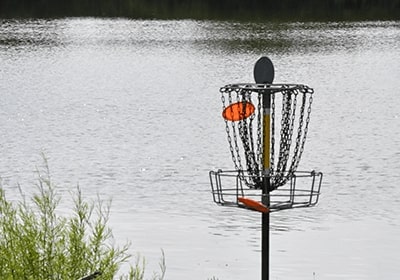 A disc thrown into a basket