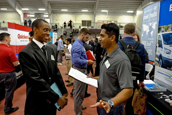 Student and Employer at AKP Career Fair