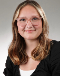 Headshot of Paityn in a black shirt