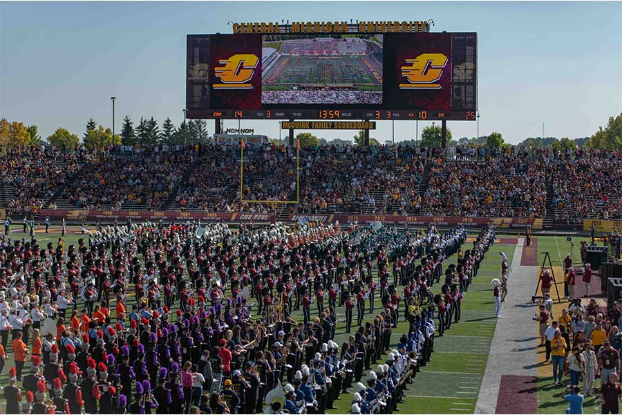 CMU Marching Chippewas and the 2023 Band Day participants march at halftime for the CMU crowd