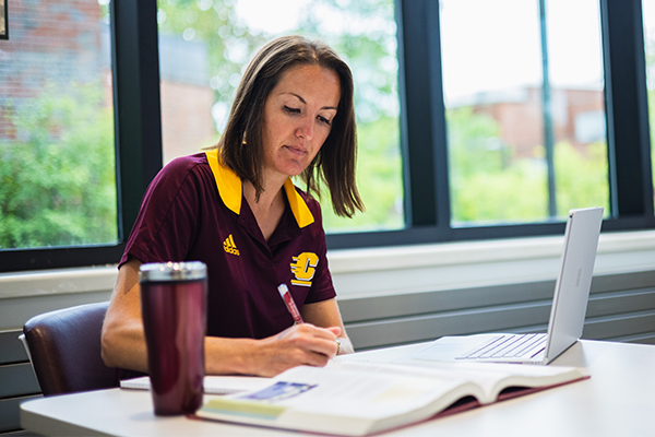 Central Michigan University Student Studying with Laptop
