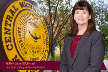 In the background is the maroon and gold seal with trees behind it.  Kelly Barton is in front wearing a grey suit coat and maroon top.  In the bottom left are following words: MAJ Kelly Barton, USA, Retired Director of Military and Veteran Relations
