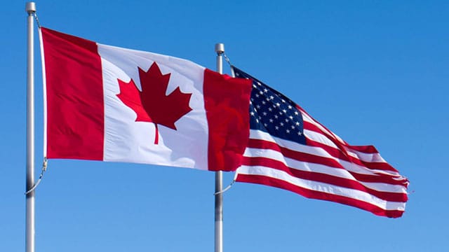 Canadian and American flags