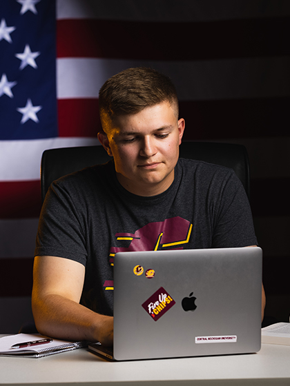 CMU student on laptop