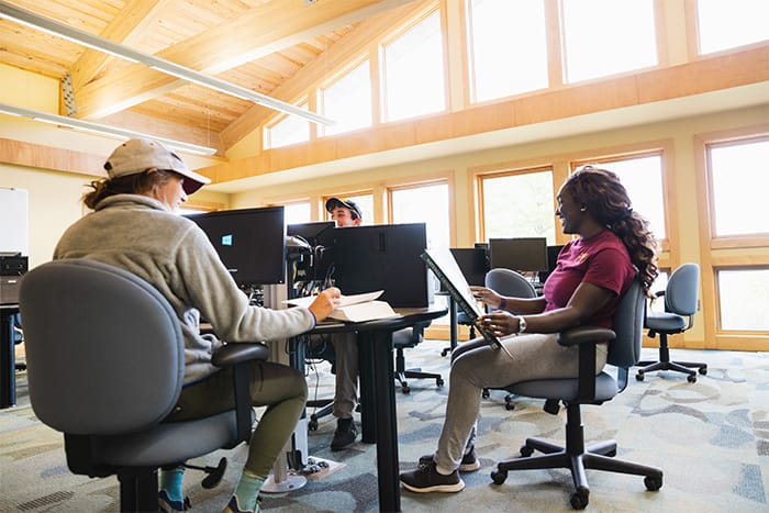 A group of students work in the computer lab at the Central Michigan University Biological Station on Beaver Island.
