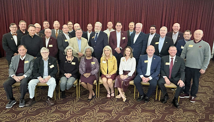 A group photo of the CMU Advancement Board of Directors taken during Homecoming 2025.
