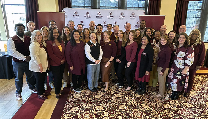 The CMU alumni board poses for a group photo during Homecoming 2025.