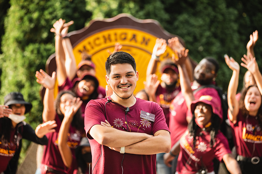 Students in front of the Central Michigan University seal by Warriner Hall