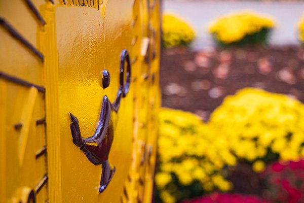 A close up view of the Central Michigan University seal statue.