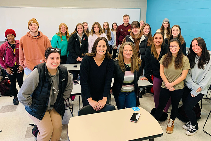 Recreation, Parks and Leisure alumna Michelle Elliott poses with students in Lori Irwin's Intro to Recreation and Event Management class
