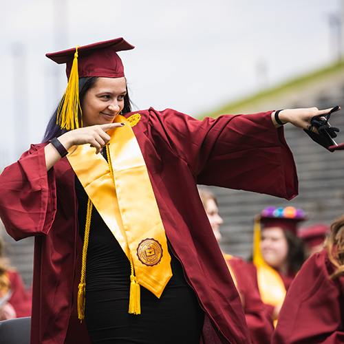 Happy graduate at 2020 commencement