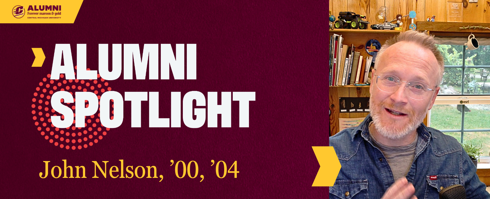 Central Michigan University Alumni Spotlight graphic for John Nelson, class of 2000 and 2004, smiling in a denim shirt in front of a pine wall, bookshelf and window.