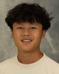 200x250 26-09-29_Lincoln Chang-4 Lincoln Chang, Oros Well-th Scholar and COMPASS Peer Educator. Dark hair, wearing a white shirt and a grey background.
