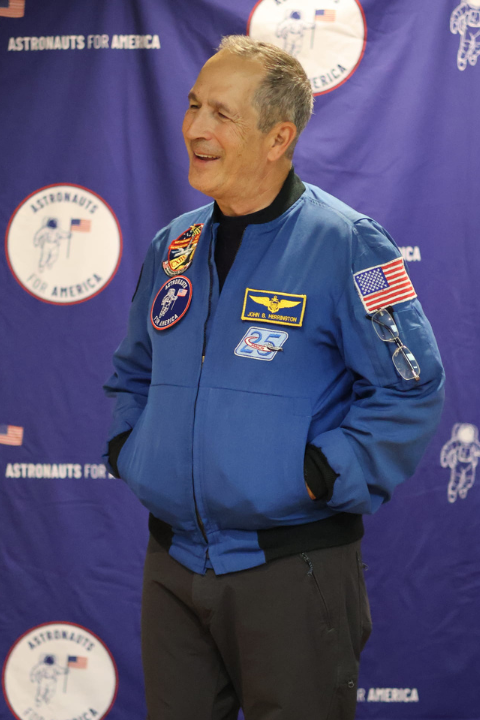 a man in a blue jacket