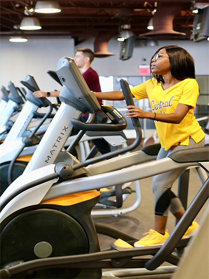 Students using stepping machines